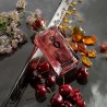 "D&G Q Intense: A dark cherry, heliotrope, amber, bold."