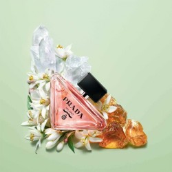 "Prada Paradoxe: A luminous, floral, amber, vibrant, modern."