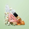 "Prada Paradoxe: A luminous, floral, amber, vibrant, modern."